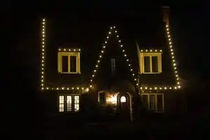 House Beautifully Decorated With Colorful Christmas Lights