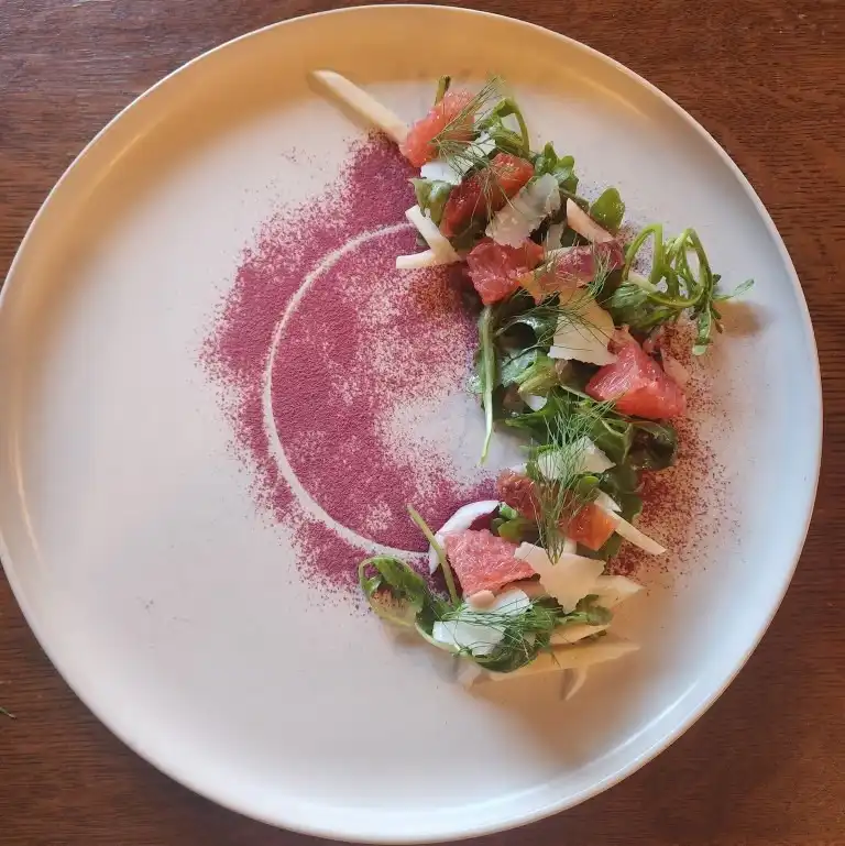 Gourmet Crudo Dish Featuring Bluefin Akami (Lean Tuna), Typically Garnished With Ingredients Like Watermelon, Citrus, And Pumpkin Seeds.
