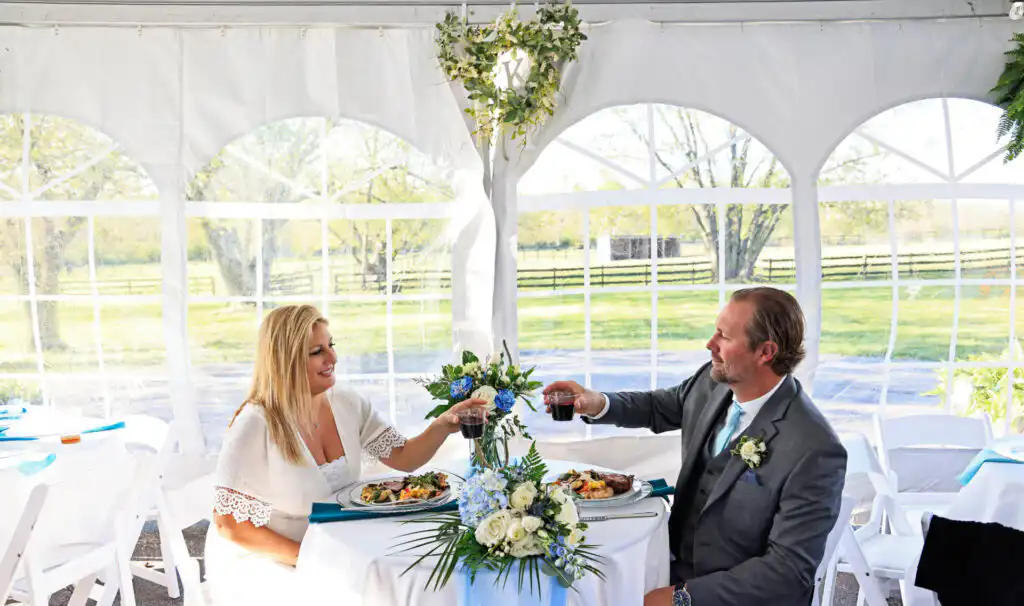 Bride and groom at a wedding reception featuring custom wedding catering in Indianapolis by Chef Shelby “Chefski”