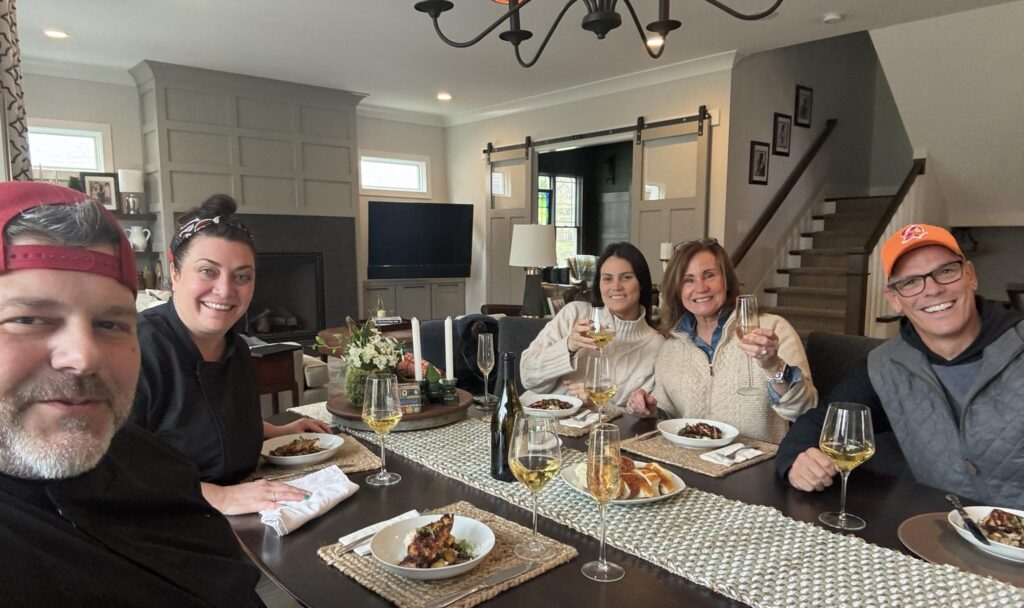 Private chef dinner party in Westfield IN with guests enjoying in-home dining experience