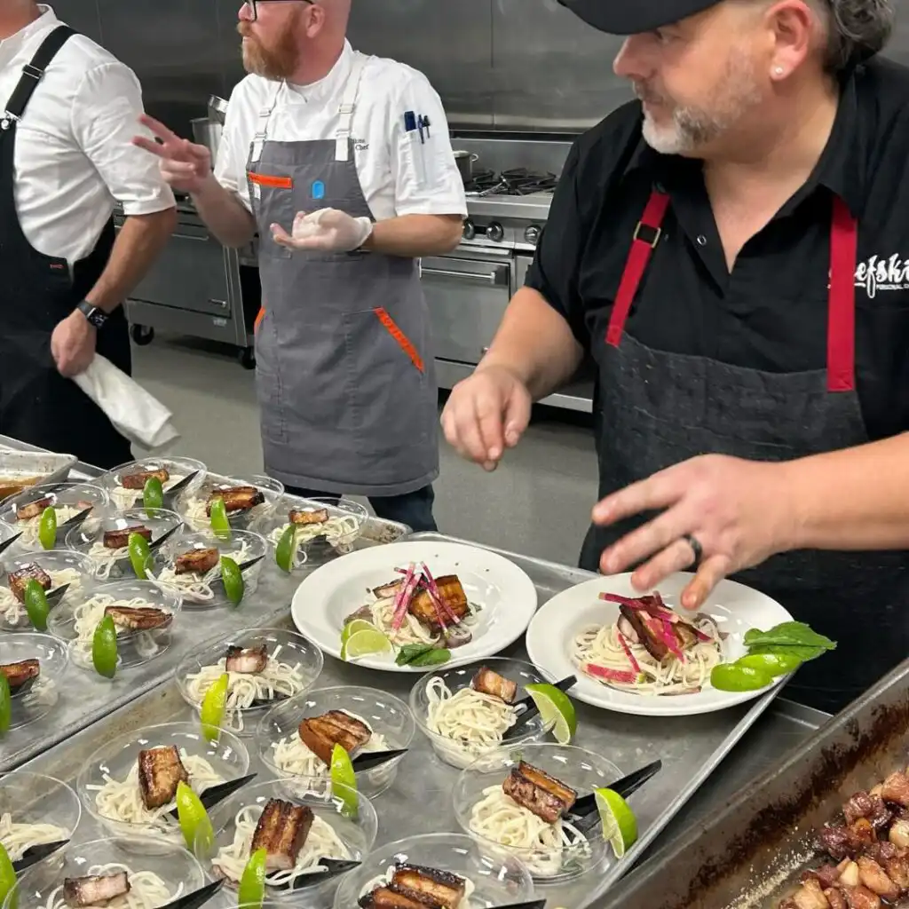 chefs preparing food for an event