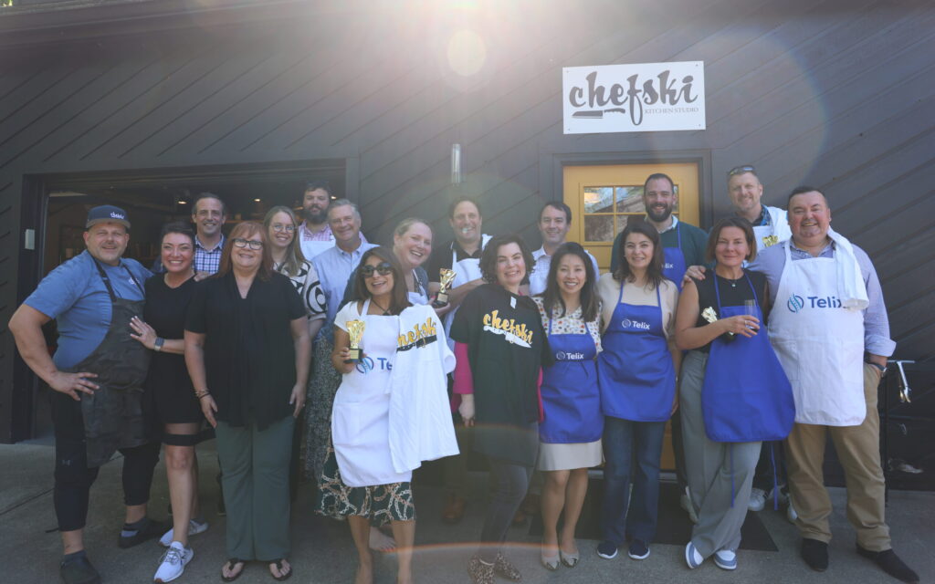 Corporate teams celebrating after completing a Chefski Cook Off team building challenge
