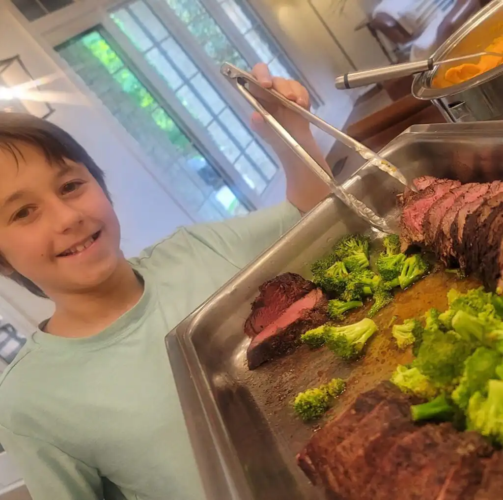 Guest enjoying personal chef graduation party catering in Indianapolis