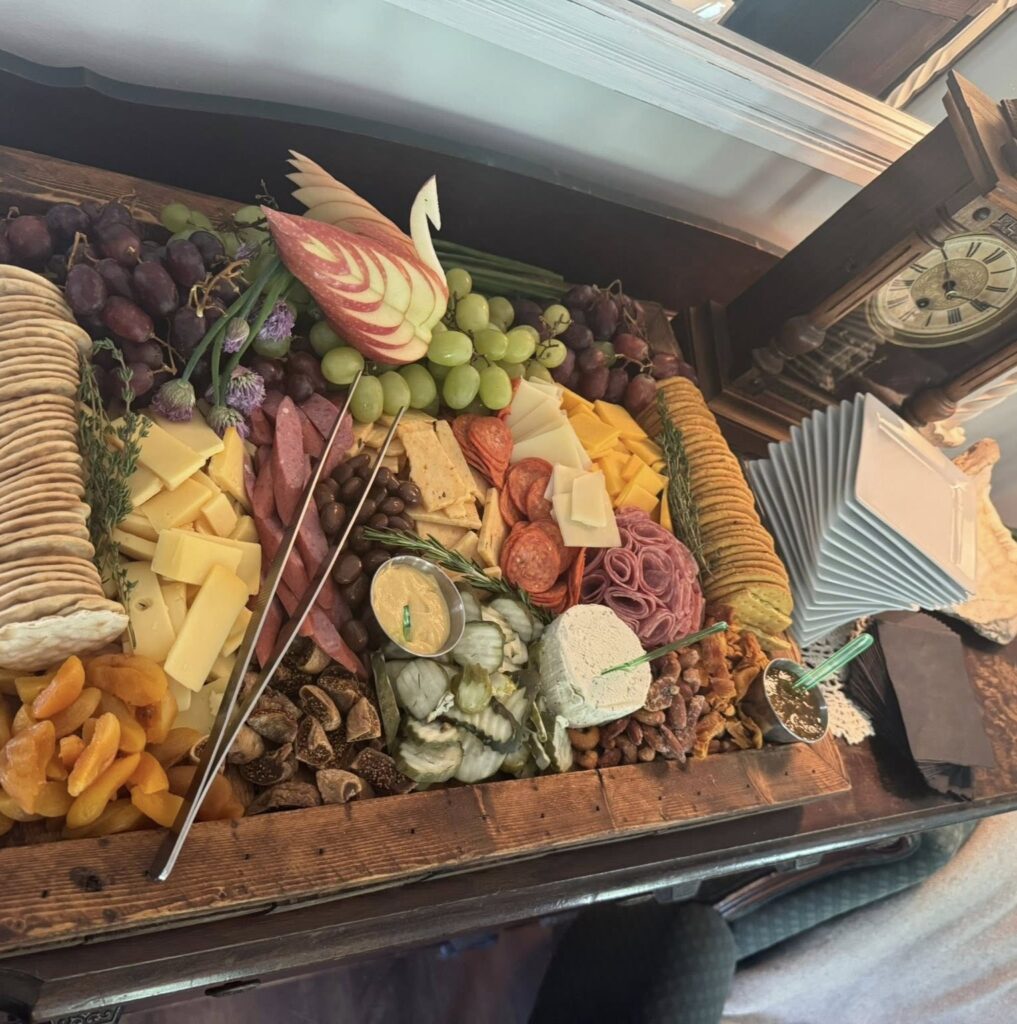 Charcuterie grazing table prepared by private chef for graduation party catering in Indianapolis