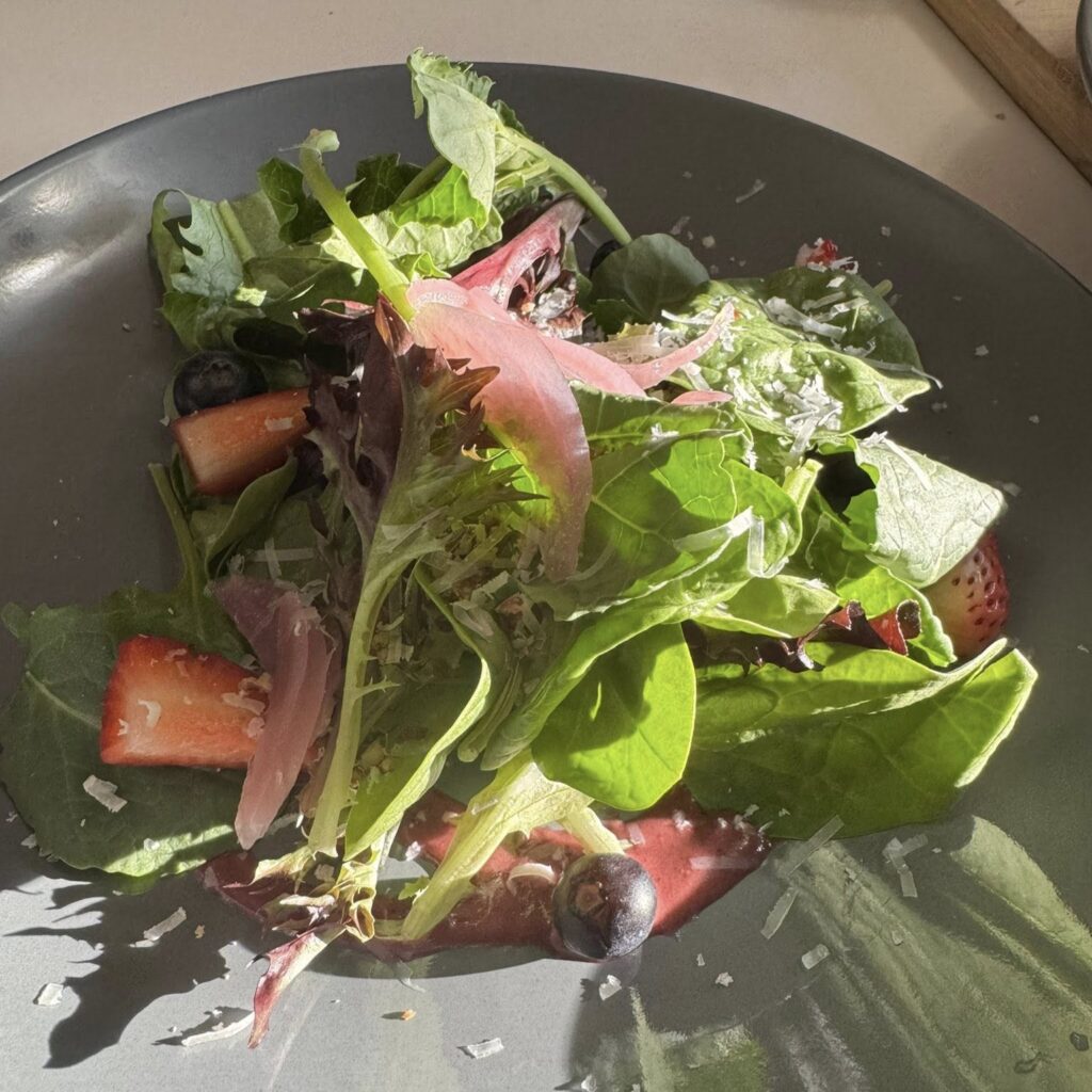 Fresh salad course prepared by private chef for graduation party catering in Indianapolis