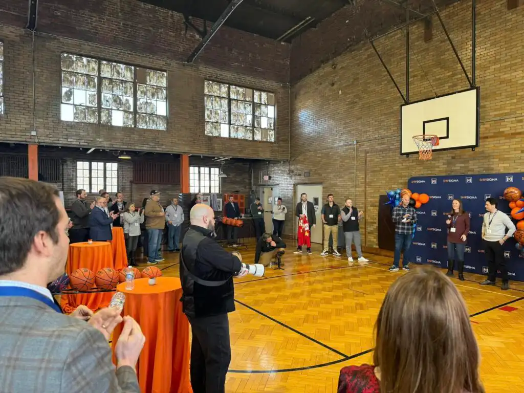 Large NCAA corporate event inside gymnasium venue in Indianapolis with professional catering by Chefski