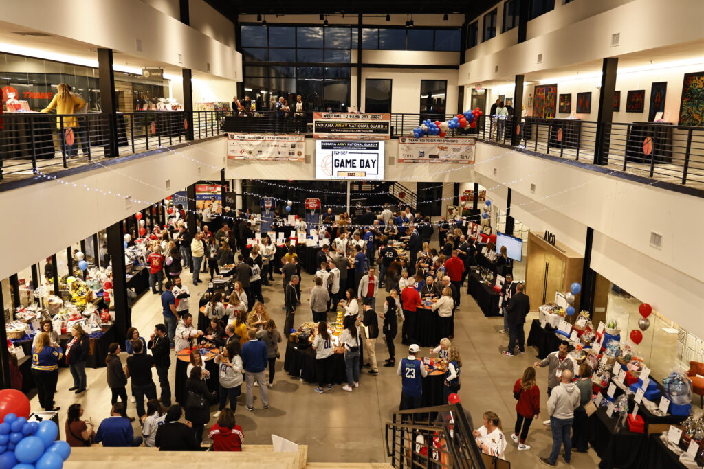Large NCAA corporate event in Indianapolis featuring full-service catering by Chefski for a high-capacity crowd