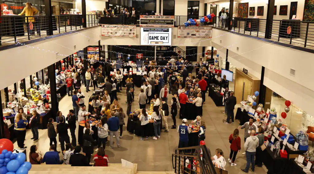 Large NCAA corporate event in Indianapolis featuring full-service catering by Chefski for a high-capacity crowd