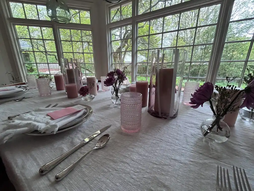 Professional private chef serving gourmet Mother's Day dinner in home
