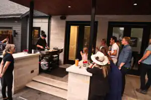 Guests enjoying a luxury private chef dining experience at an Indianapolis residence